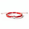 Pulsera de hilo rojo con tres medallas de San Benito