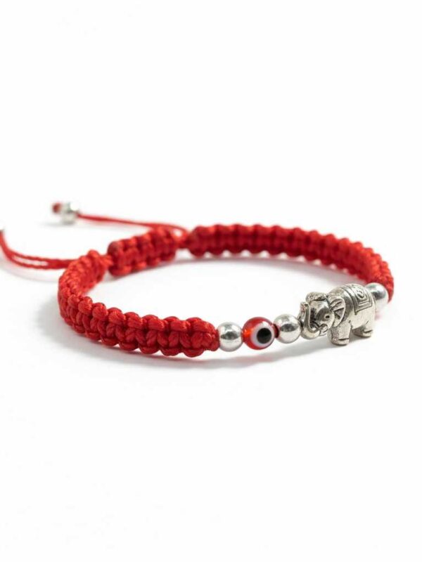 Pulsera de hilo rojo con dije de elefante y ojo turco