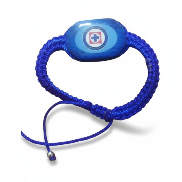 Pulsera de hilo tejido con el escudo de la Máquina Celeste (Cruz Azul)