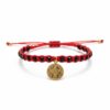 Pulsera tejida: Elegancia, brillo y la medalla de San Benito