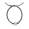 Pulsera de chaquira negra y San Benito: Poder, elegancia y blindaje absoluto