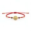 Pulsera de chaquira roja y San Benito: Fuerza, suerte y protección divina