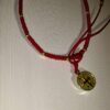 Pulsera de chaquira: San Benito, lujo y protección en rojo y dorado