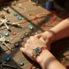 Pulsera de chaquira roja: Triple protección con mano de Fátima, ojo turco