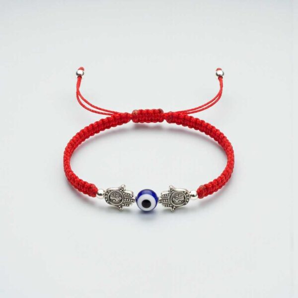 Pulsera de doble poder: Hamsa gemela, ojo turco y la fuerza del rojo