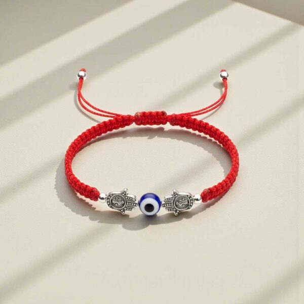 Pulsera de doble poder: Hamsa gemela, ojo turco y la fuerza del rojo