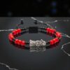 Pulsera devocional: Santa Muerte, poder y pasión (rojo y negro mate)