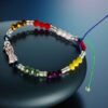 💀 Pulsera de los siete poderes: Santa Muerte, semi cristal y mate multicolor