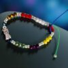 💀 Pulsera de los siete poderes: Santa Muerte, semi cristal y mate multicolor