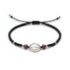 Pulsera de chaquira negra y San Benito: Poder, elegancia y blindaje absoluto