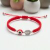 Pulsera de doble protección: San Benito, ojo turco y la energía del rojo