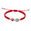 Pulsera de doble protección: San Benito, ojo turco y la energía del rojo