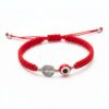 Pulsera de doble protección: San Benito, ojo turco y la energía del rojo