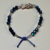 Pulsera de la Santa Muerte: Sabiduría, calma y protección (azul marino y cristal)