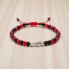 🌹 Pulsera de la Santa Muerte: Duelo de poder (rojo y negro mate)
