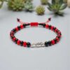 🌹 Pulsera de la Santa Muerte: Duelo de poder (rojo y negro mate)
