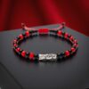 🌹 Pulsera de la Santa Muerte: Duelo de poder (rojo y negro mate)