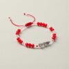 ❤️ Pulsera de la Santa Muerte: Claridad, pasión y protección (rojo mate y cristal)