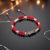 ❤️ Pulsera de la Santa Muerte: Claridad, pasión y protección (rojo mate y cristal)